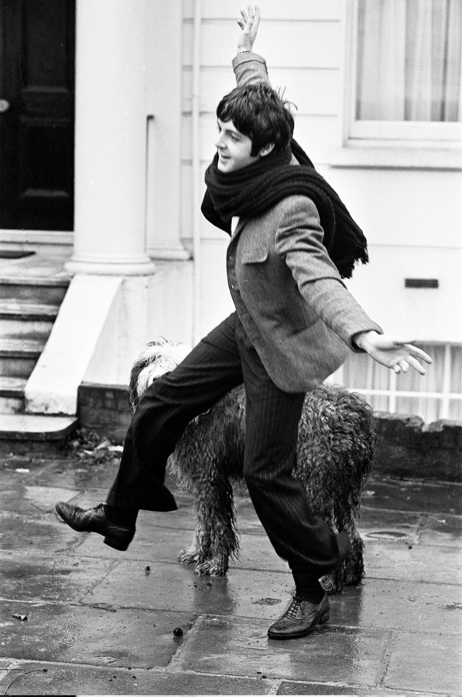 Image may contain Paul McCartney Clothing Coat Face Head Person Photography Portrait Body Part Finger and Hand