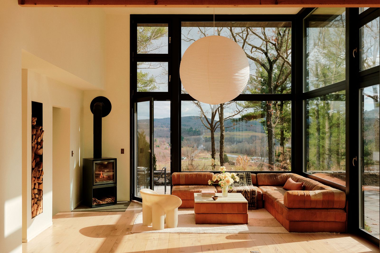 Image may contain Indoors Interior Design Chair Furniture Architecture Building Living Room Room Window and Lamp