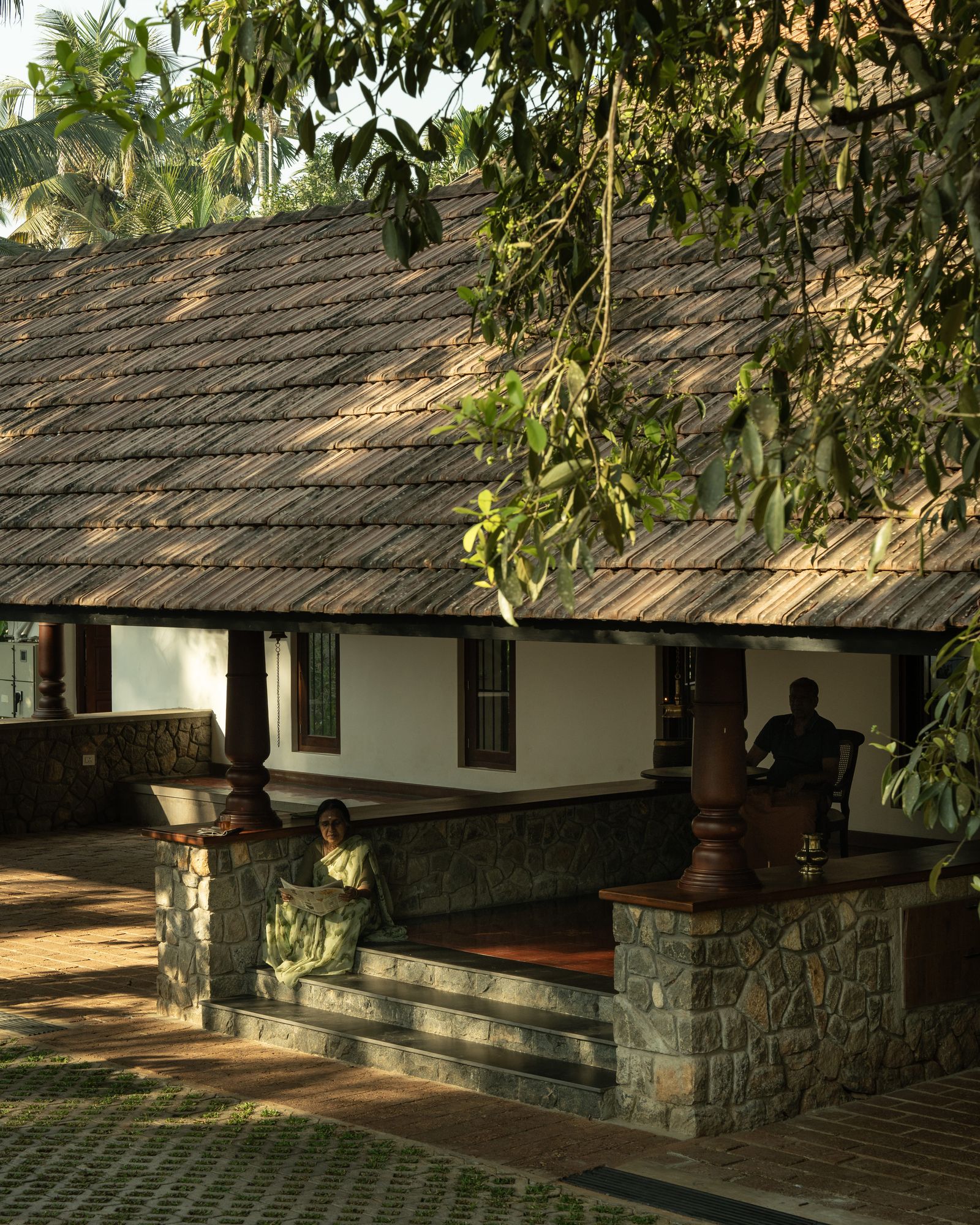 Image may contain Indoors Interior Design Architecture Building Furniture Living Room Room Floor Foyer and Bench