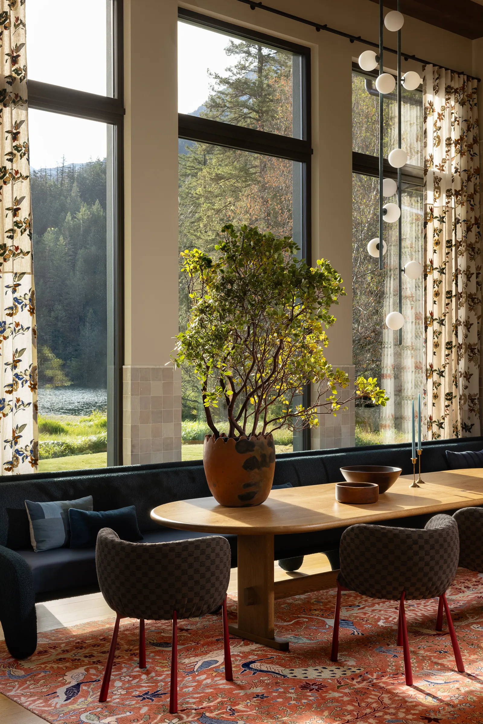 Image may contain Window Plant Chair Furniture Table Dining Table Indoors Interior Design Windowsill and Home Decor