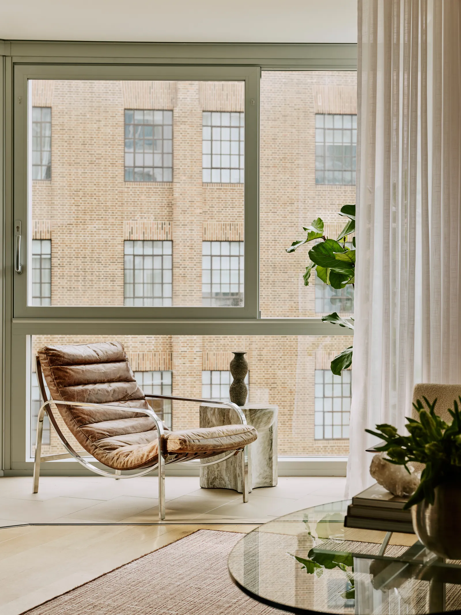 Image may contain Furniture Chair Window and Plant