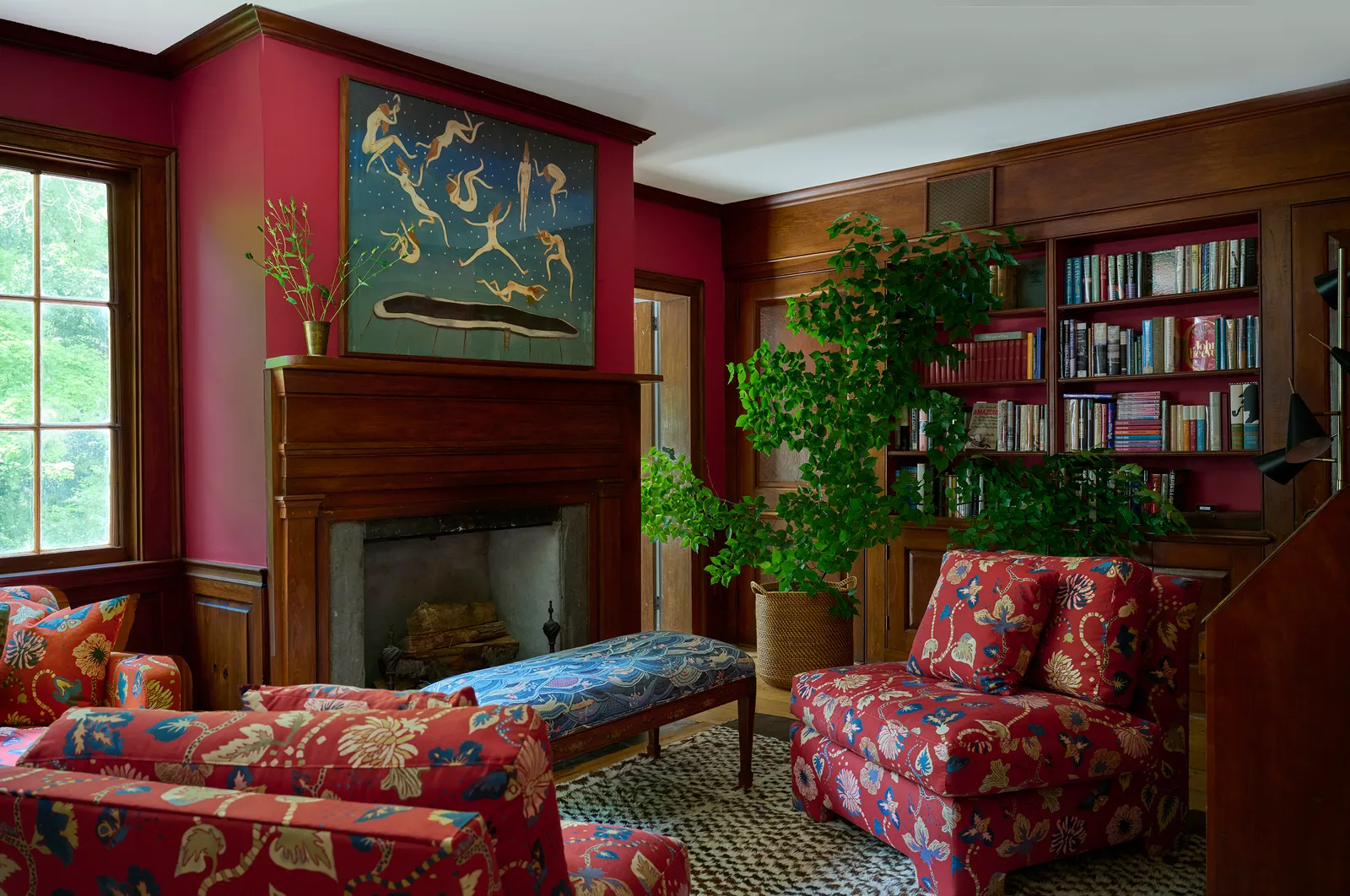 Image may contain Indoors Interior Design Architecture Building Furniture Living Room Room Fireplace and Home Decor