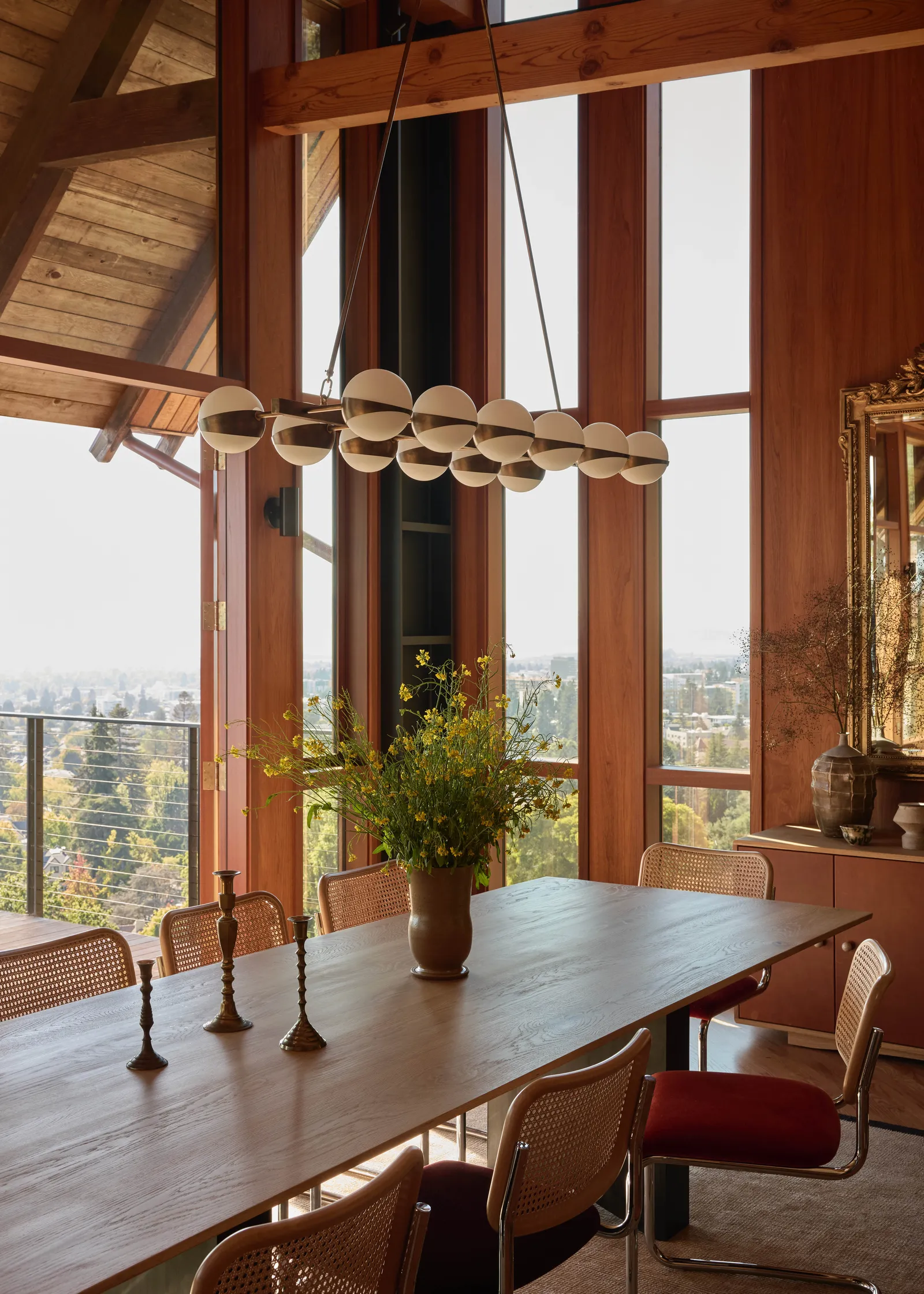 Image may contain Indoors Interior Design Architecture Building Dining Room Dining Table Furniture Room and Table